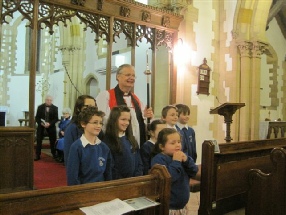 Bishop Richard with the Children's Choir
