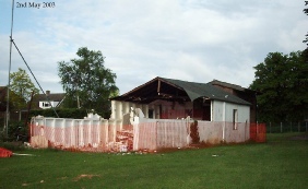 Moggerhanger pavilion being demolished 2 May 2003